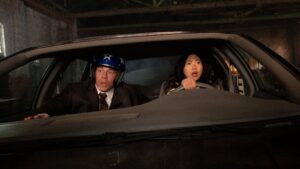 Awkwafina and John Cena in a scene from the movie "Jackpot!"